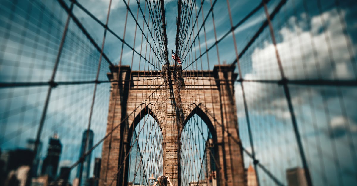 Backup photos to the cloud while traveling? - Blur Photo of Brooklyn Bridge at Daytime