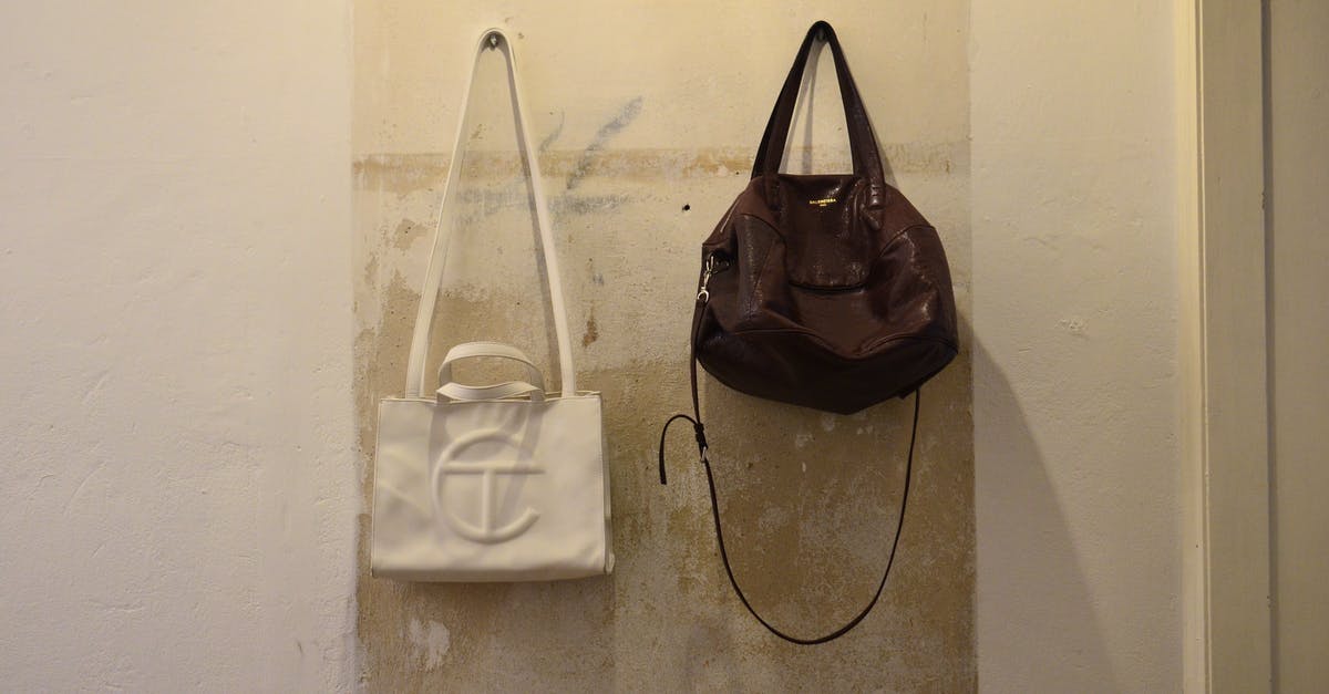 Bag straps get stiff? - Bag hanging on shabby wall