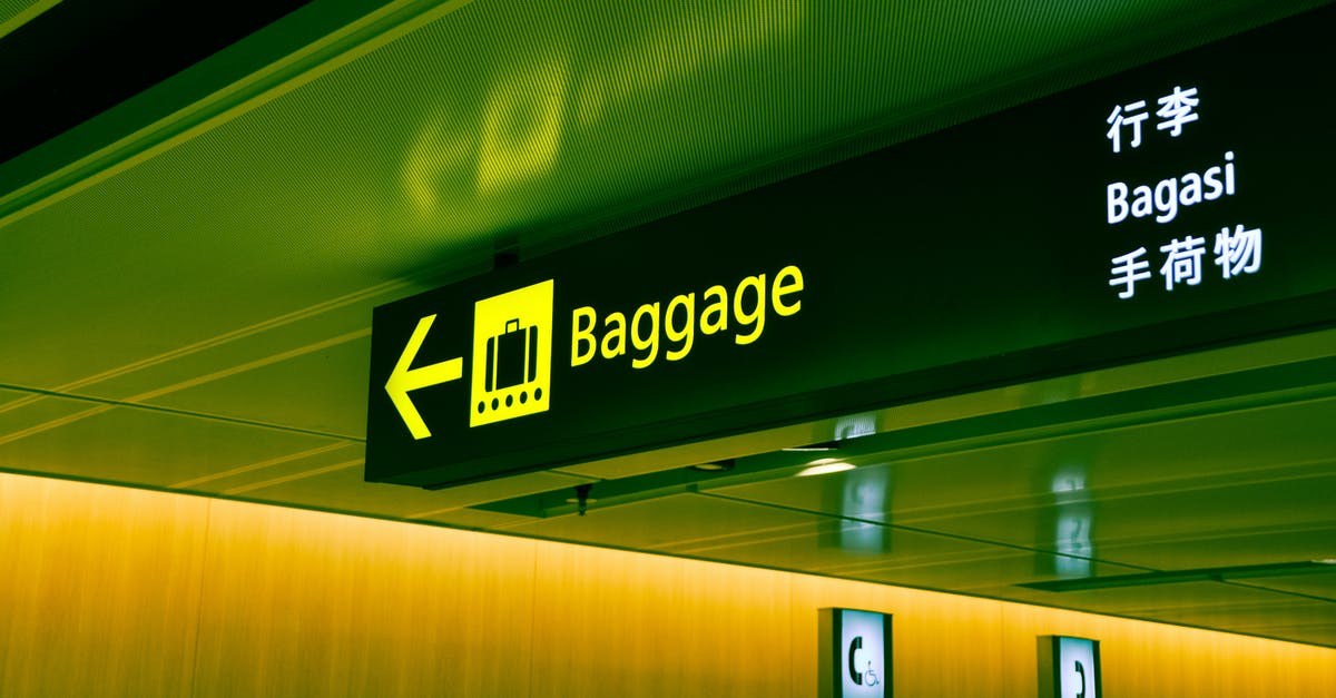 Baggage allowance [closed] - Close-up Photo of Baggage Sign