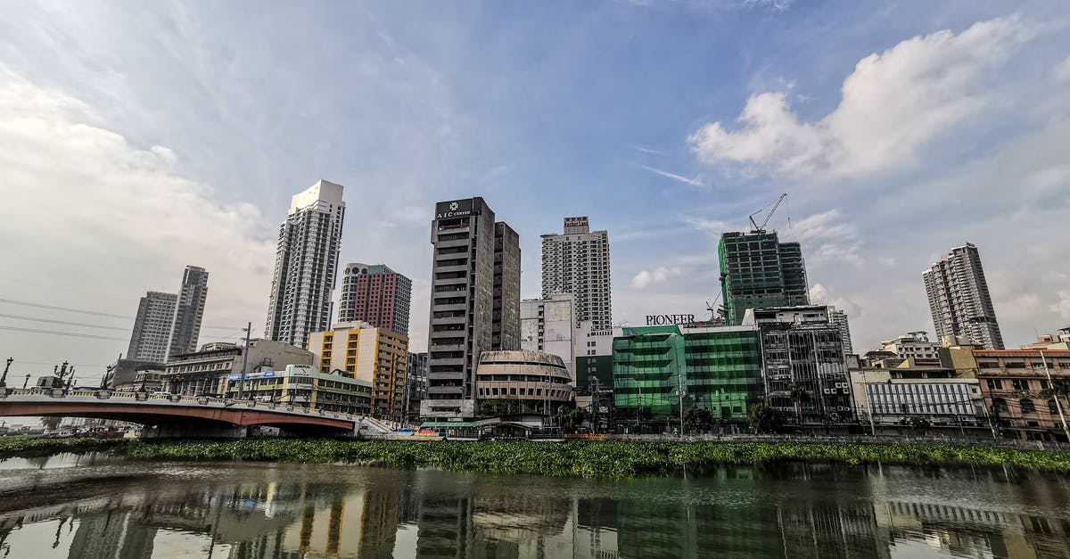 Baggage allowance with Air-Philippines from Manila - Ozamiz and Economy Supersaver ticket? - From below of contemporary towers located in office district of big city on Pasig river shore