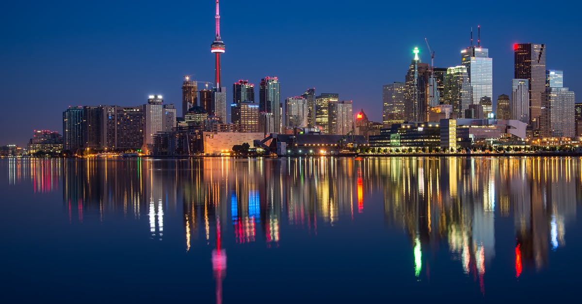 Baggage storage in downtown Toronto - Buildings Near Body Of Water At Night 