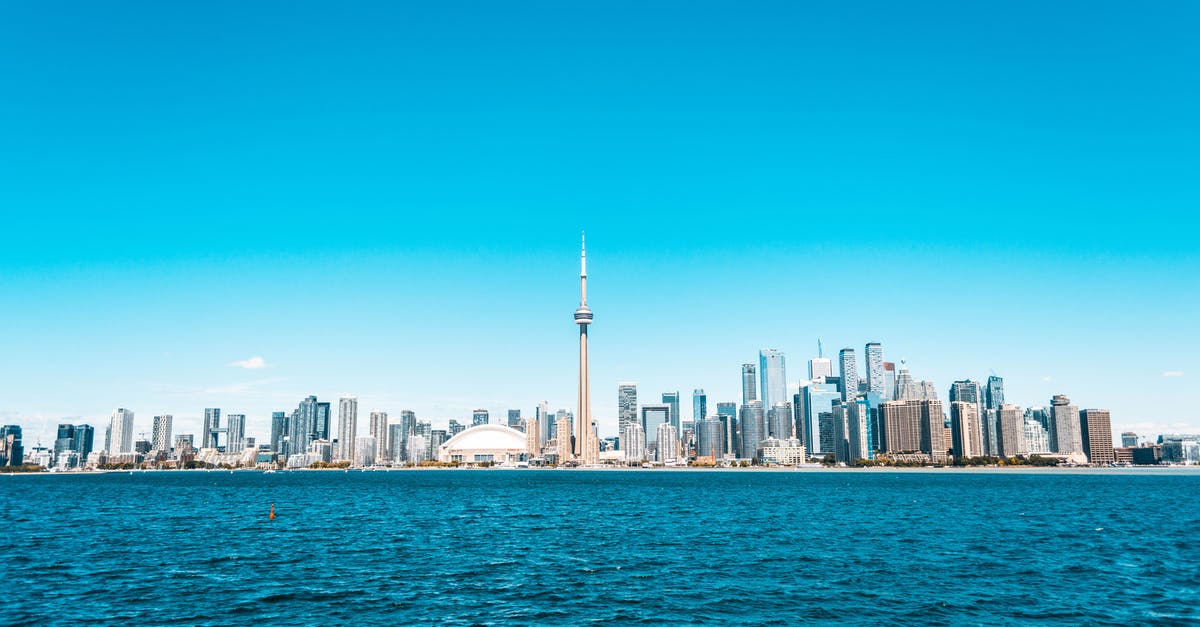 Baggage storage in downtown Toronto - City Buildings Near Sea Under Blue Sky