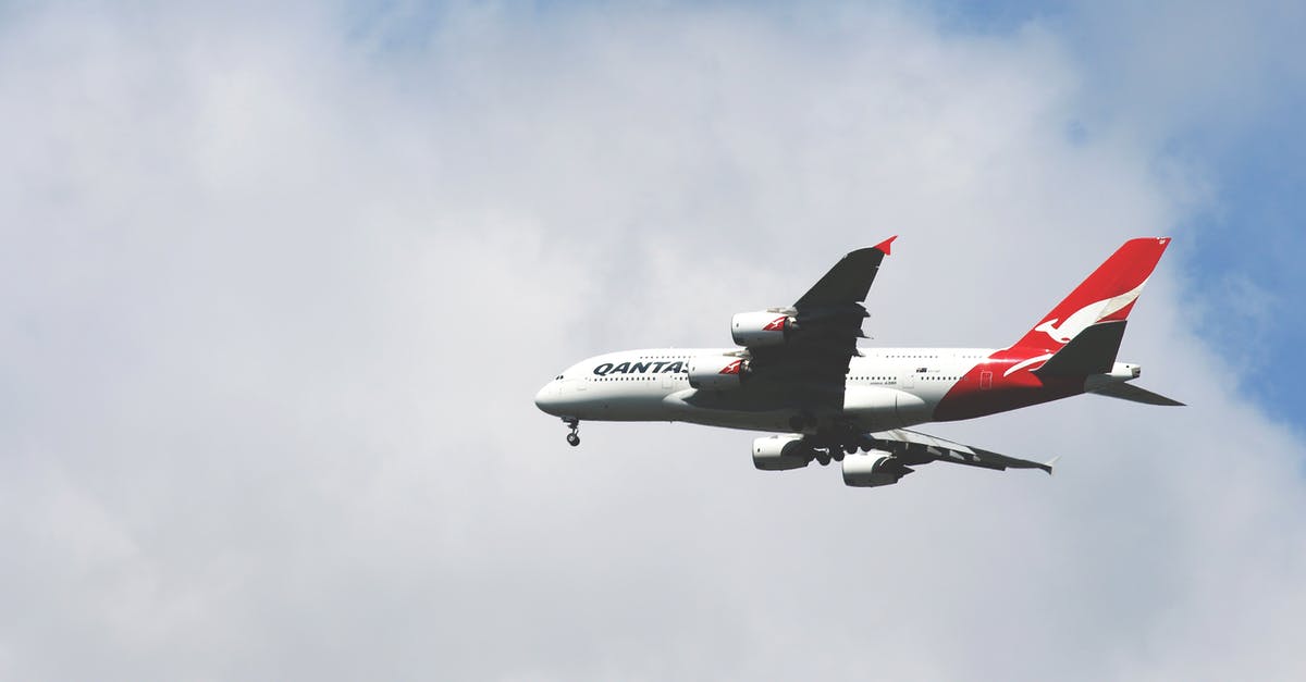 Baggage transfer from Air India to Qantas on same booking - White and Red Airplane