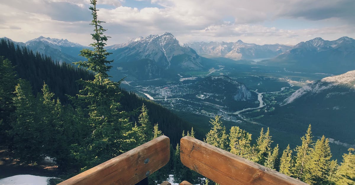 Banff to Vancouver via Kootenay and Okanagan valley in three days: does it make sense? - Scenic View Of Mountains Under Cloudy Sky