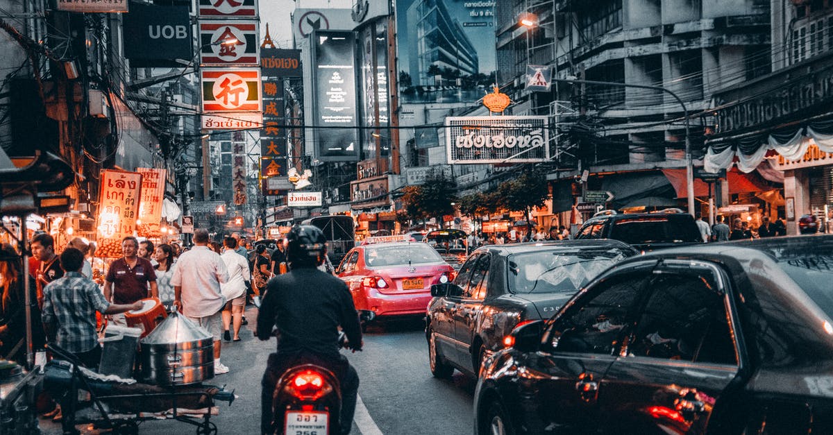 Bangkok Ekamai to Koh Chang - Crowded Street With Cars Passing By