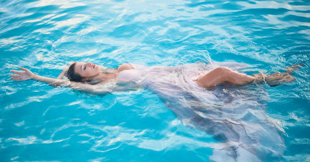 Barefoot World-trip [closed] - Feminine young woman floating in water