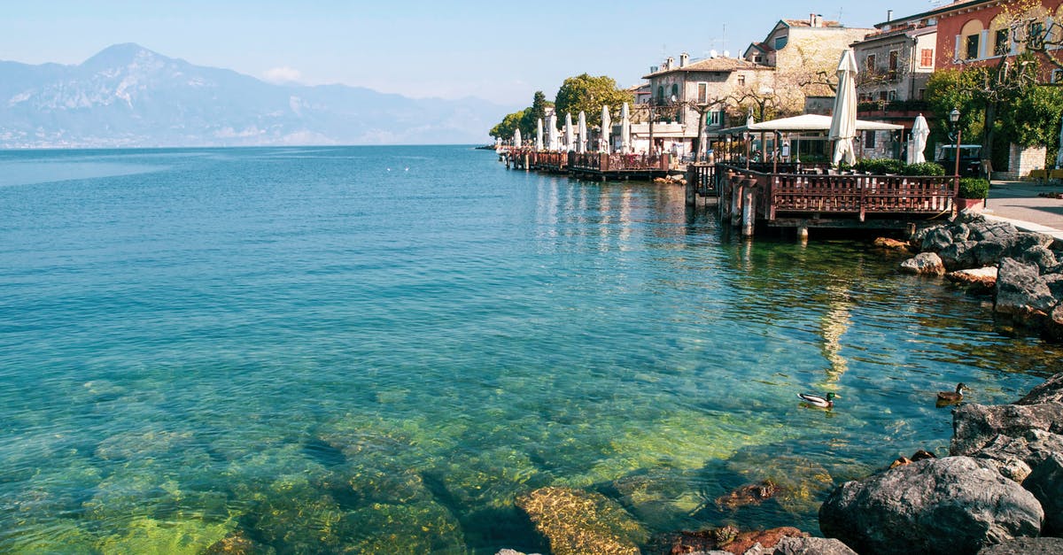 Beach North Italy [closed] - Clear Sea Water in Beach With Cottages