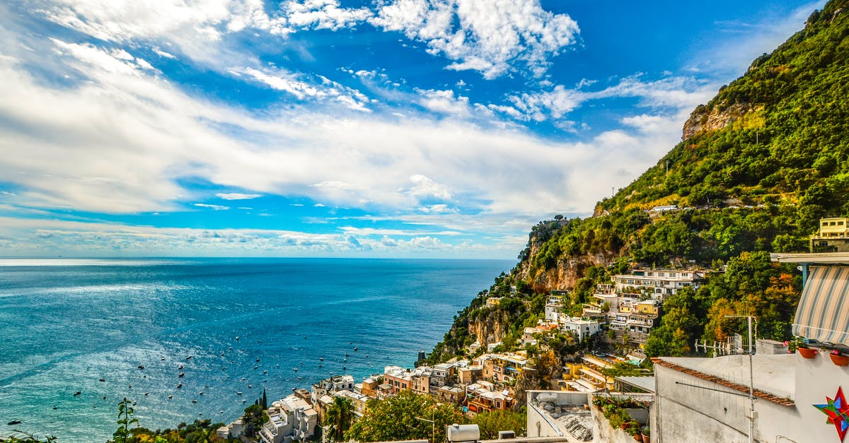 Beach North Italy [closed] - Bird's Eye View Photography of Establishment Near the Cliff