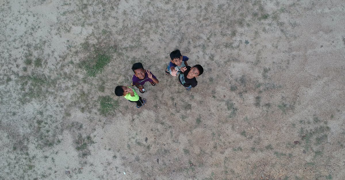 Being separated from one's young children on a flight - Kids Waving to Sky