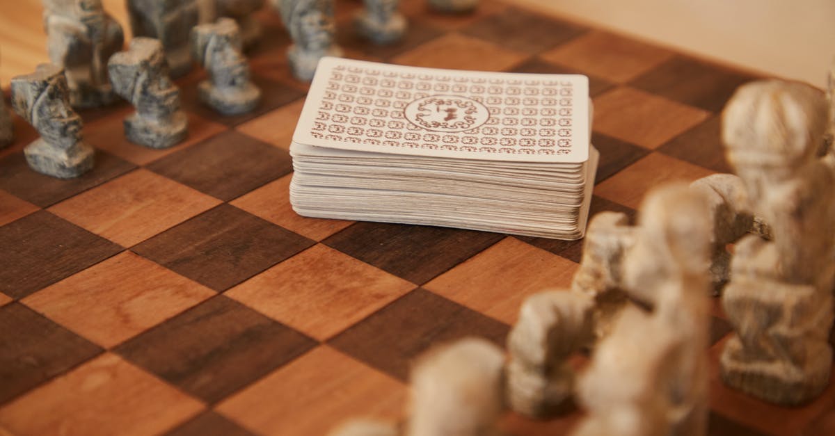 Benefit cards combination for Berlin - Chessboard with chess pieces and game of cards