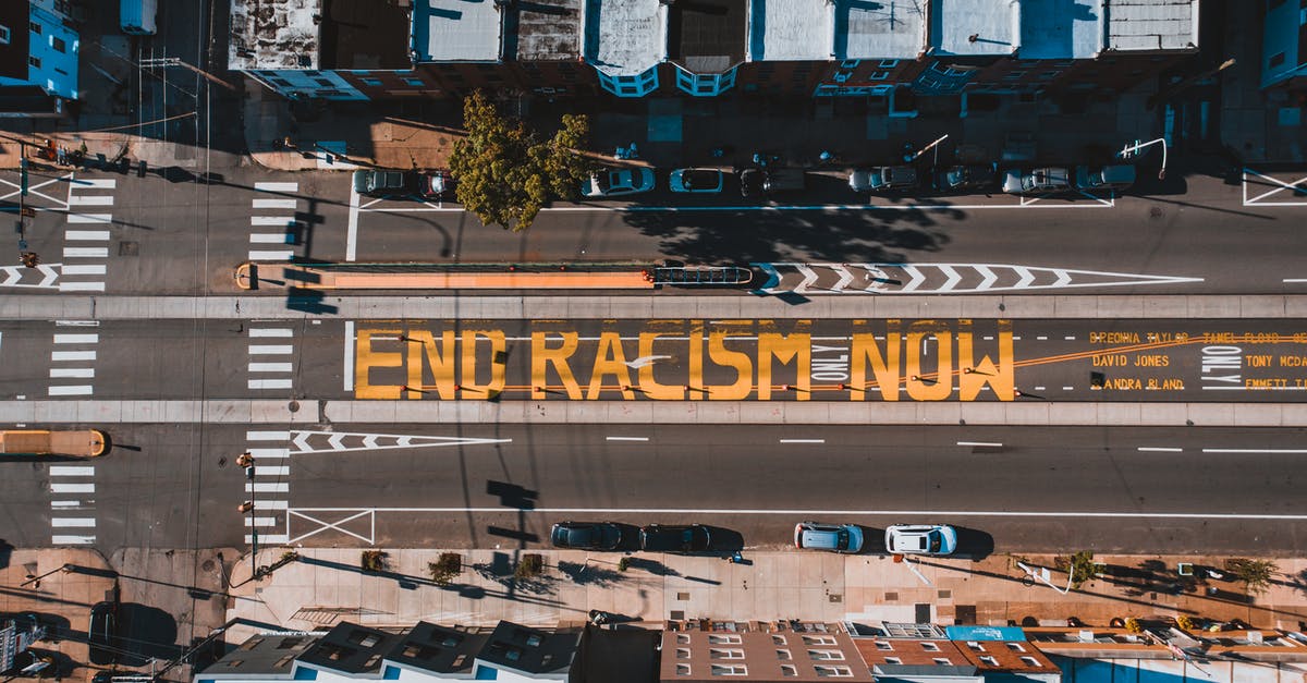 Best road route from Córdoba to Mendoza, Argentina? - Roadway with END RACISM NOW title in town