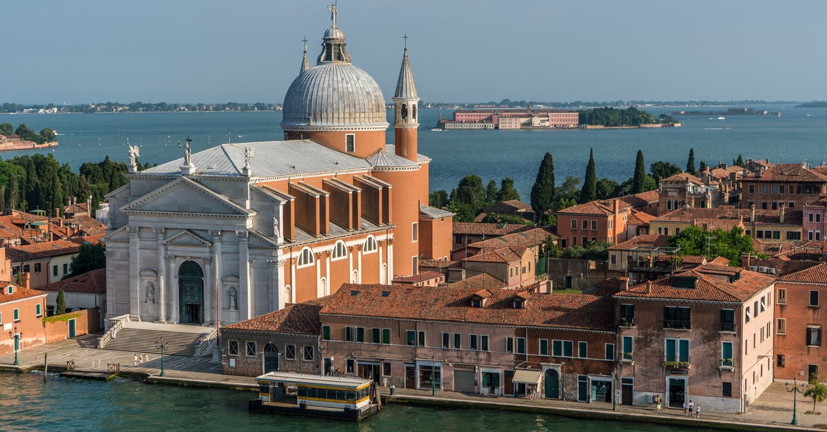 Best time for Mediterranean cruise - White and Beige Structure Building and Cathedral Near Body of Water during Daytime