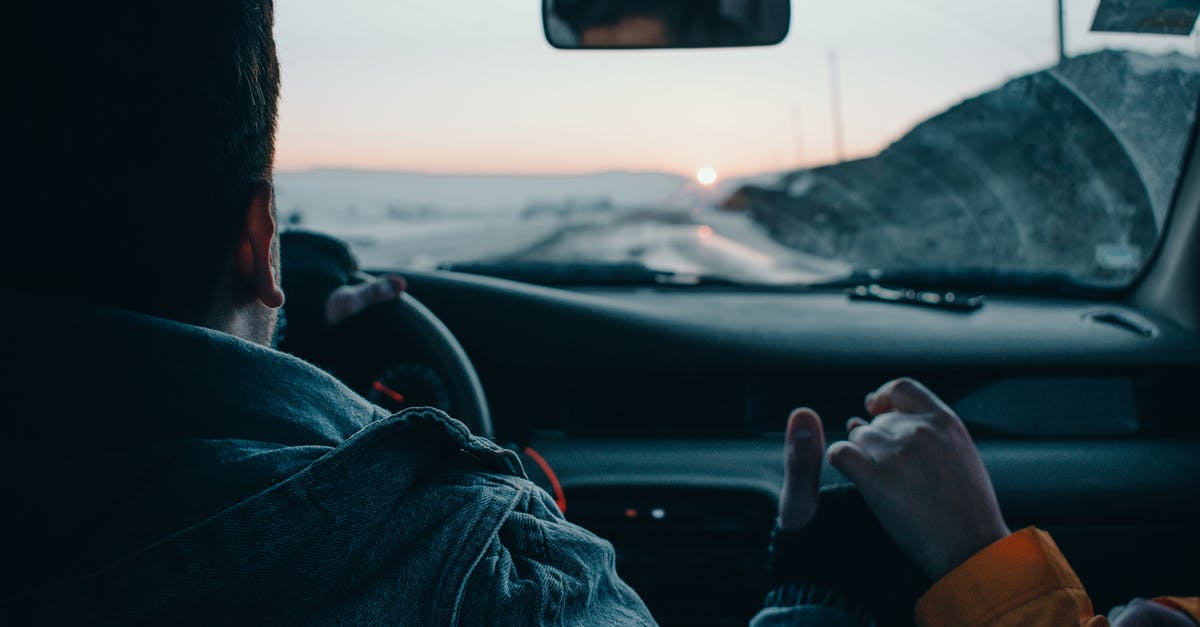 Best Way of Travelling Weekly [closed] - Unrecognizable couple travelling in car