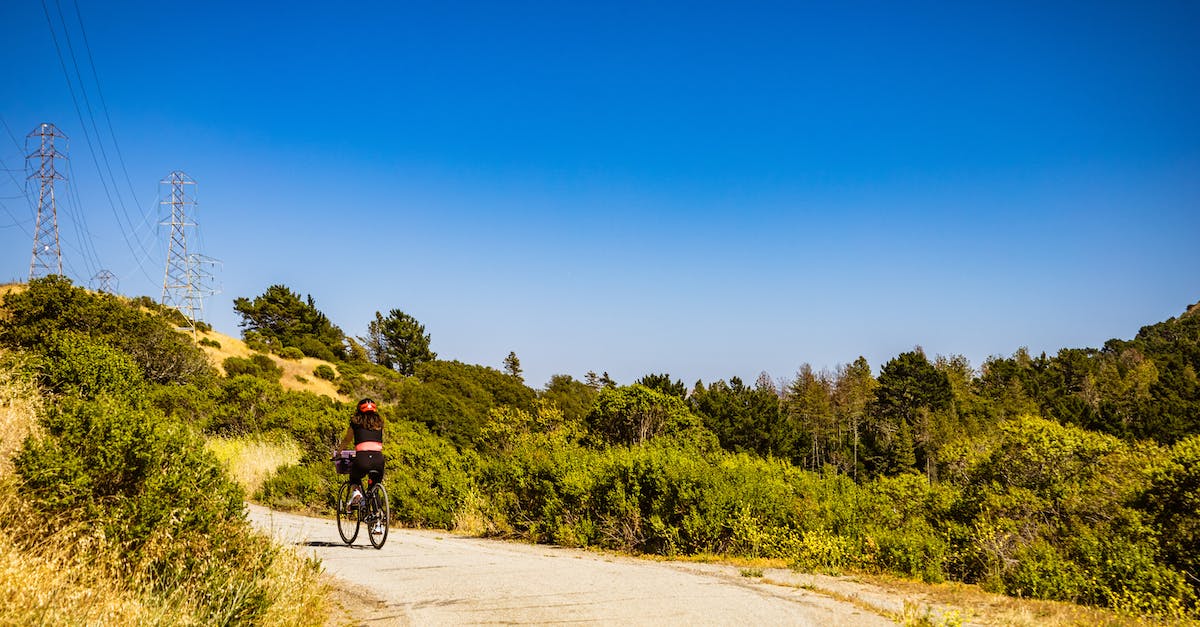 Biking in Arizona: Homebase in Phoenix or Scottsdale? - Man in Black Shirt Riding Bicycle on Road