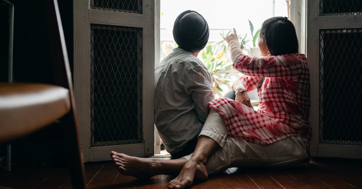 Boarding point change for an Indian rail reservation - Husband and wife spending time at home