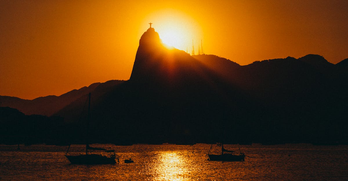 Boats from Manaus, Brazil to Leticia, Colombia? - Silhouette of Two Boats on Body of Water