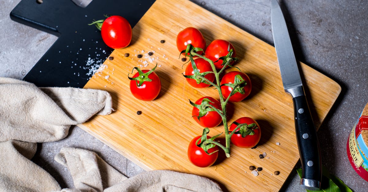 Bonneville Salt Flats - access? - Red Tomato Beside Stainless Steel Bread Knife on Brown Wooden Chopping Board