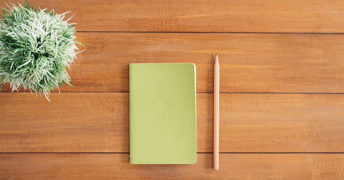 Book connecting flight, but only board at second airport? - White Notes Beside a Pencil on Brown Wooden Surface