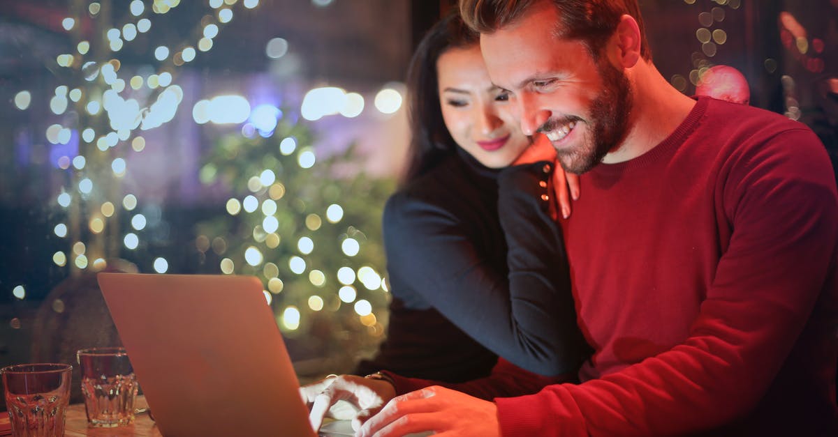 Booking Disney World in Orlando tickets online - Man in Red Long-sleeved Shirt