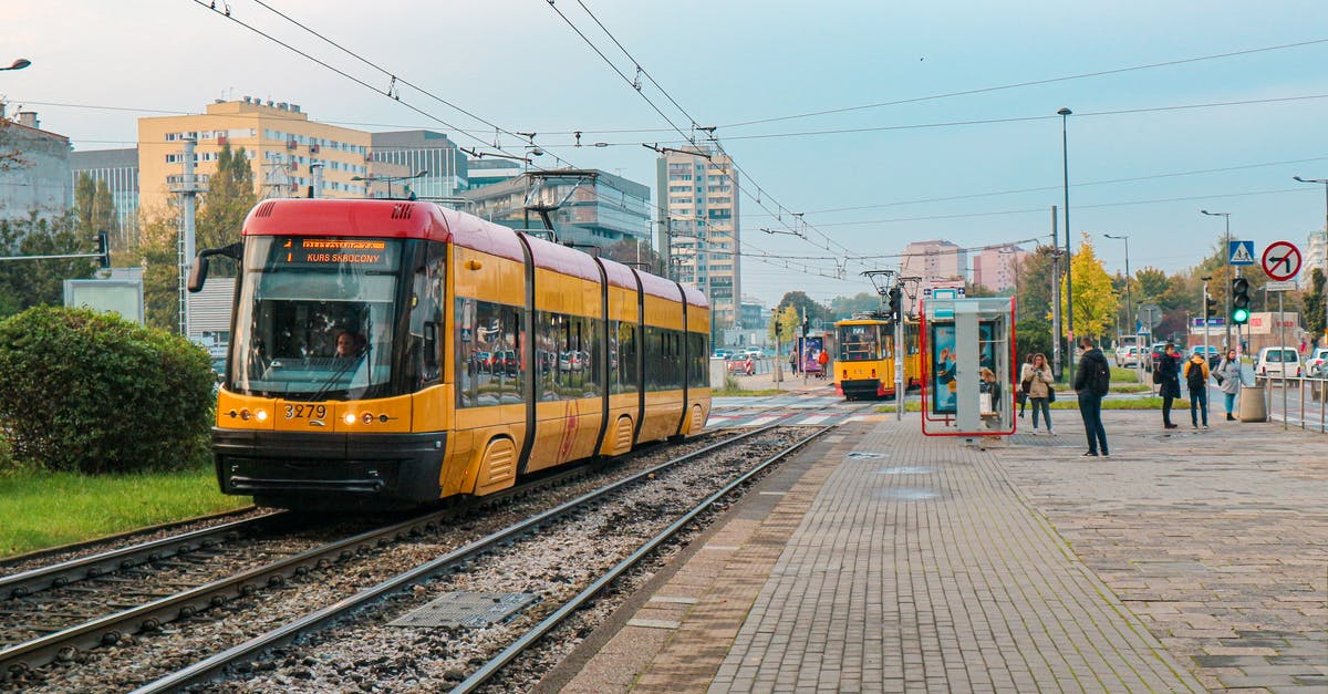 Booking for intra-EU trains - Yellow Train on Railway Track