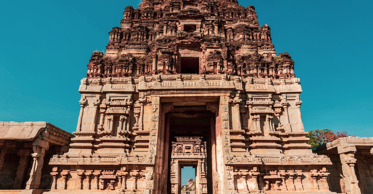 Bouldering guide for Hampi (India) - Brown Concrete Building Under the Blue Sky