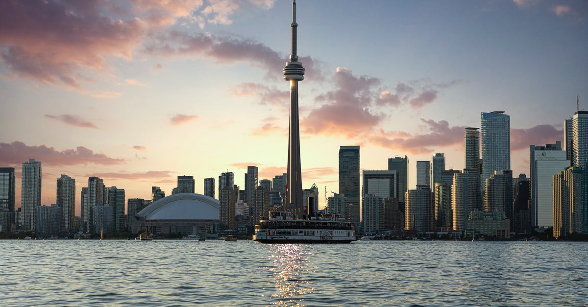 Brazilian citizen with Romanian working visa: Can I travel to Canada without a visa? - Photo of CN Tower During Golden Hour