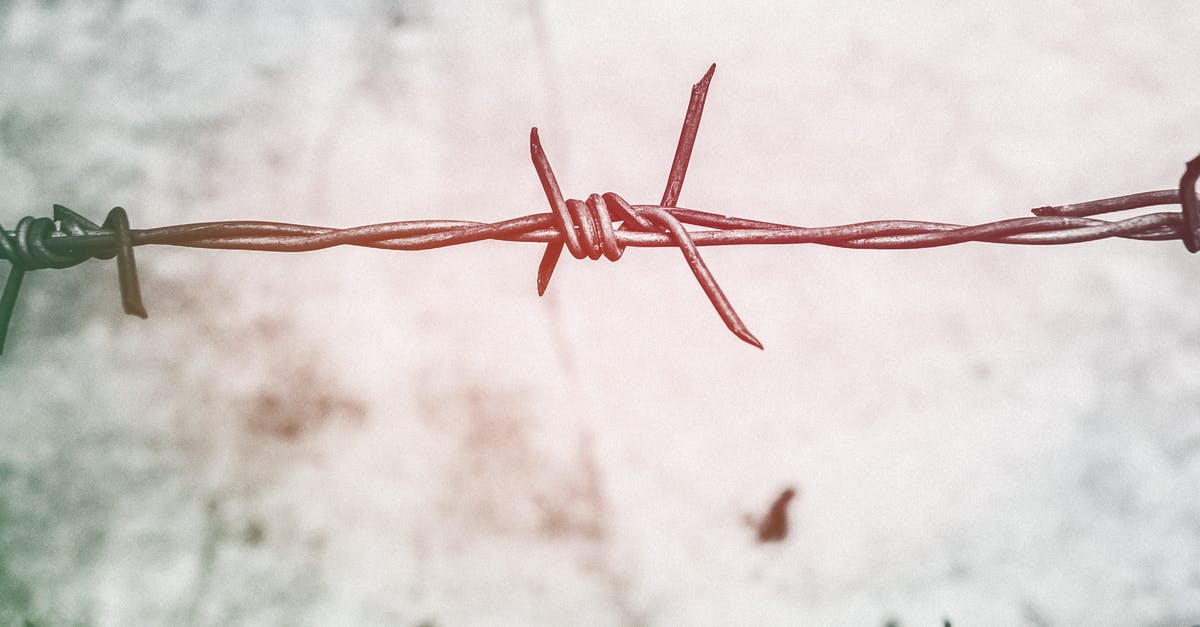 Brexit and questions at the border [closed] - Shallow Focus Photography of Brown Barbed Wire