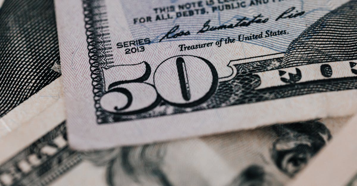 Bringing cash into the USA [closed] - From above closeup of American dollar banknote with signature and printed words above paper money