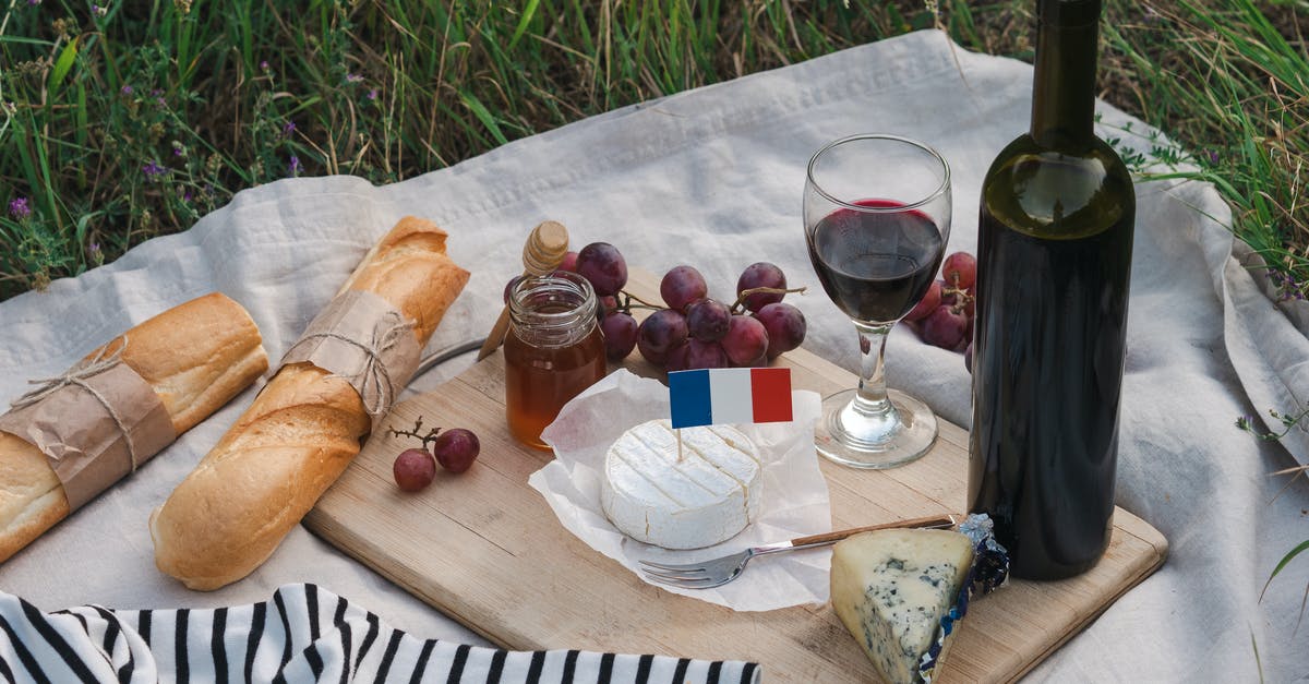 Bringing cheese to Canada from France - French Traditional Food On Picnic Blanket