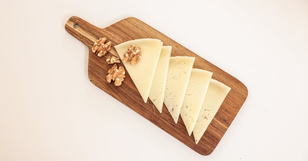 Bringing food items into the UK (from Chile) - White Cheese on Brown Wooden Chopping Board