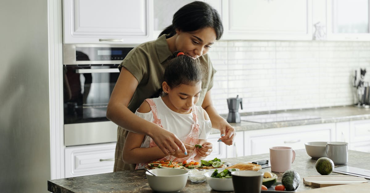 Bringing home-dried vegetables into the USA - Mother and Daughter Preparing Avocado Toast