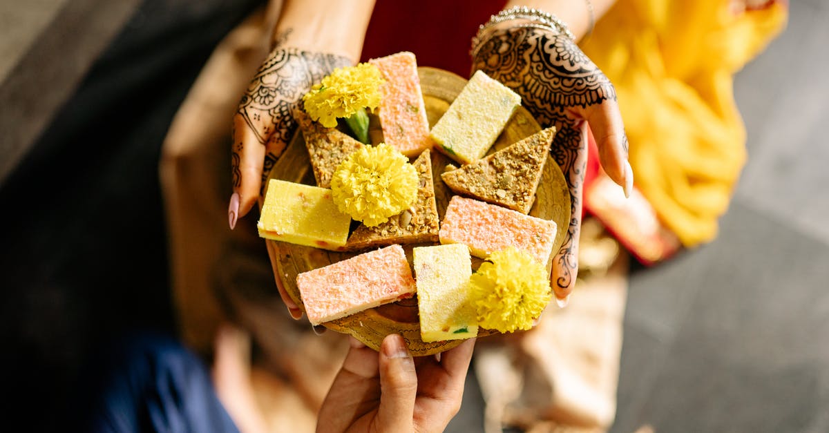 Bringing Indian Pulses to the US? - Person Holding Brown and Green Box