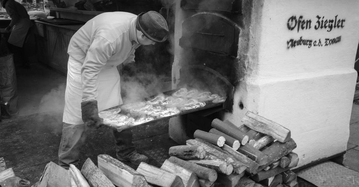 Bringing outdoor food to Japan - Man Preparing Street Food in Oven