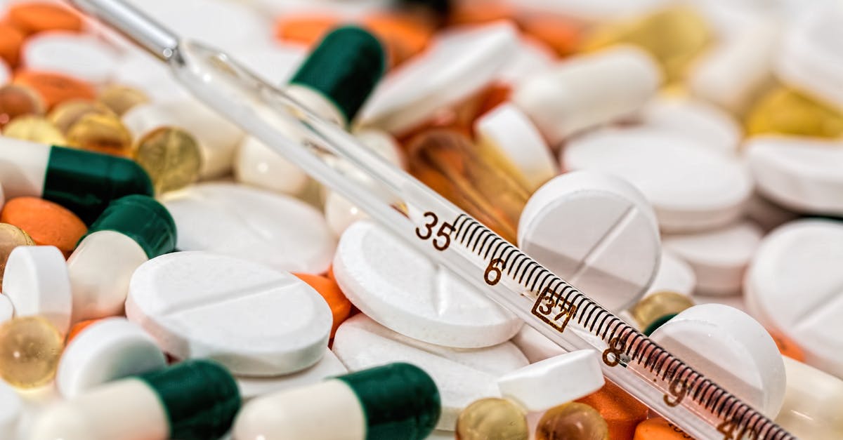 Bringing prescription drugs into Bangkok - Thermometer on Medical Pills