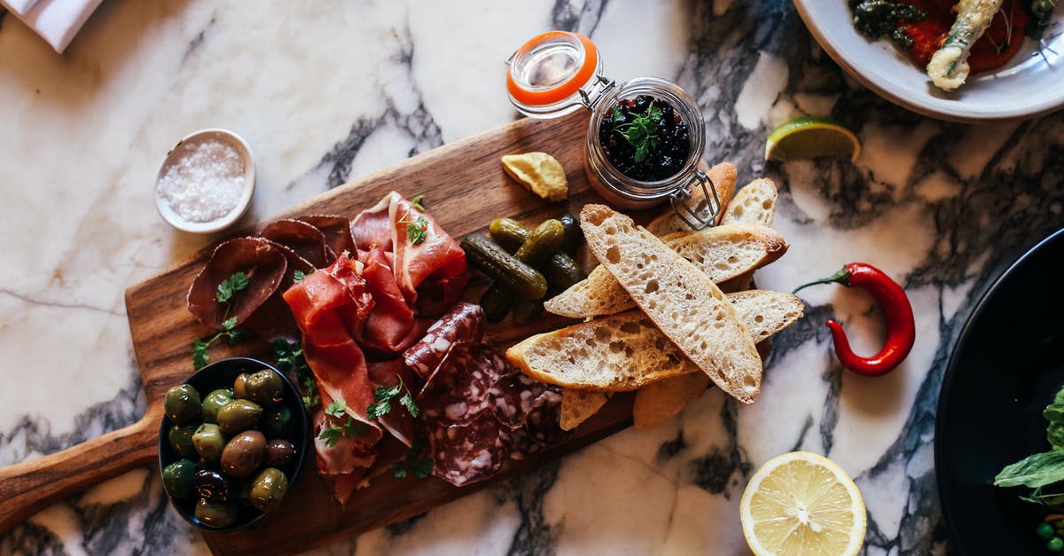 Bringing whale meat in to the EU - Meat Platter with Bread and Olives