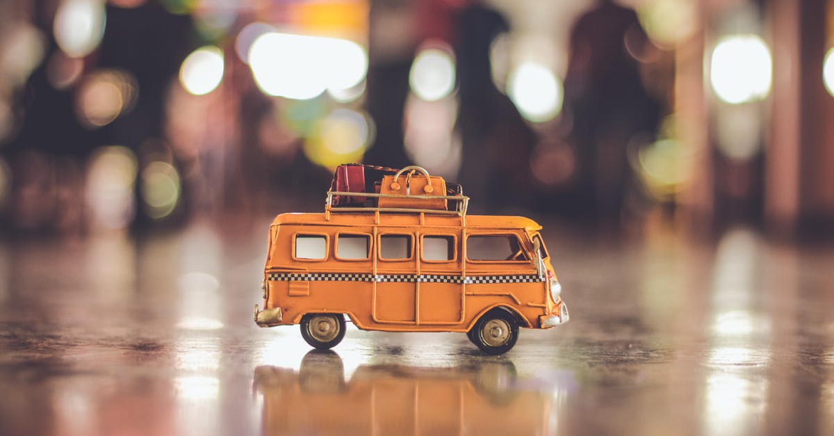 Bus from Van/Turkey to Tabriz/Iran - Selective Focus Photography of Yellow School Bus Scale Model