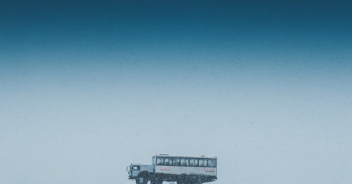 Bus travel from Salgótarján to Nagymaros on Easter Sunday - Aged vehicle with anonymous tourists driving on mount in wintertime