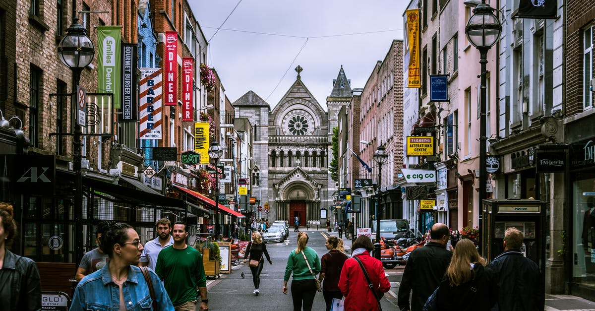 Business visit in Ireland followed by tourist visa in Netherlands - Photo of People Walking on Street