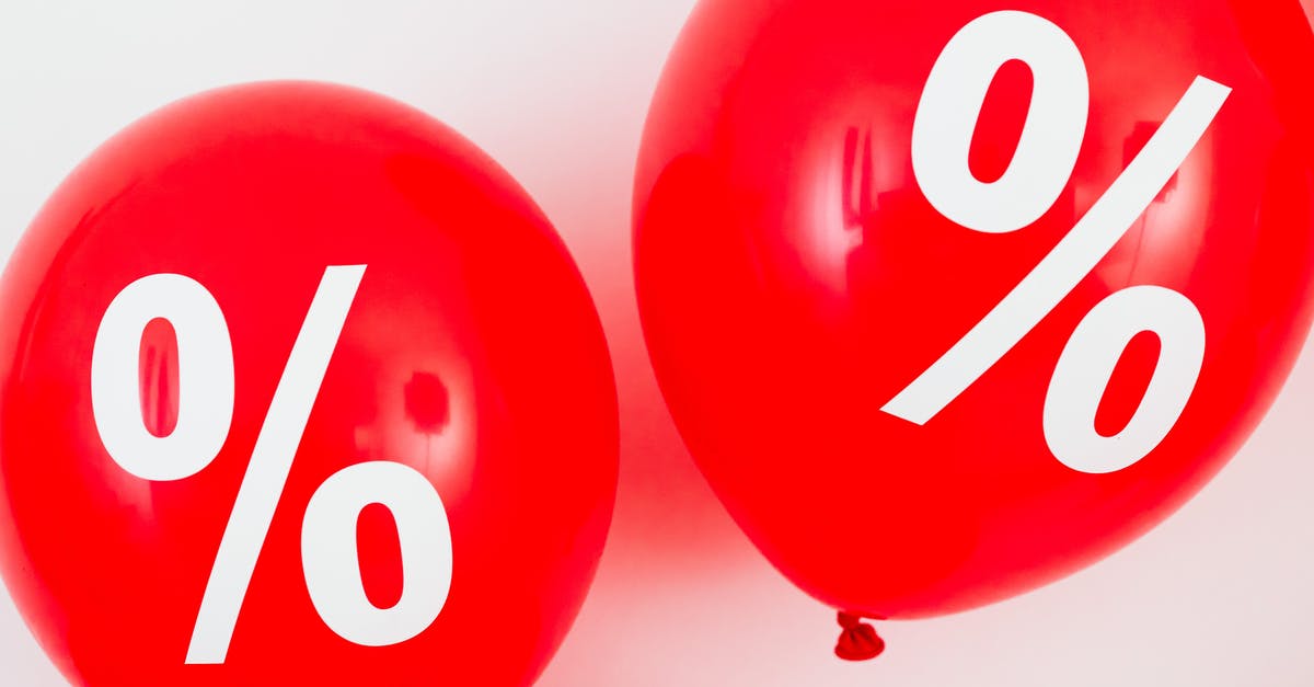 Buy airfares now or after the sale? [closed] - Two Red Balloons With Percentage Symbols on White Background