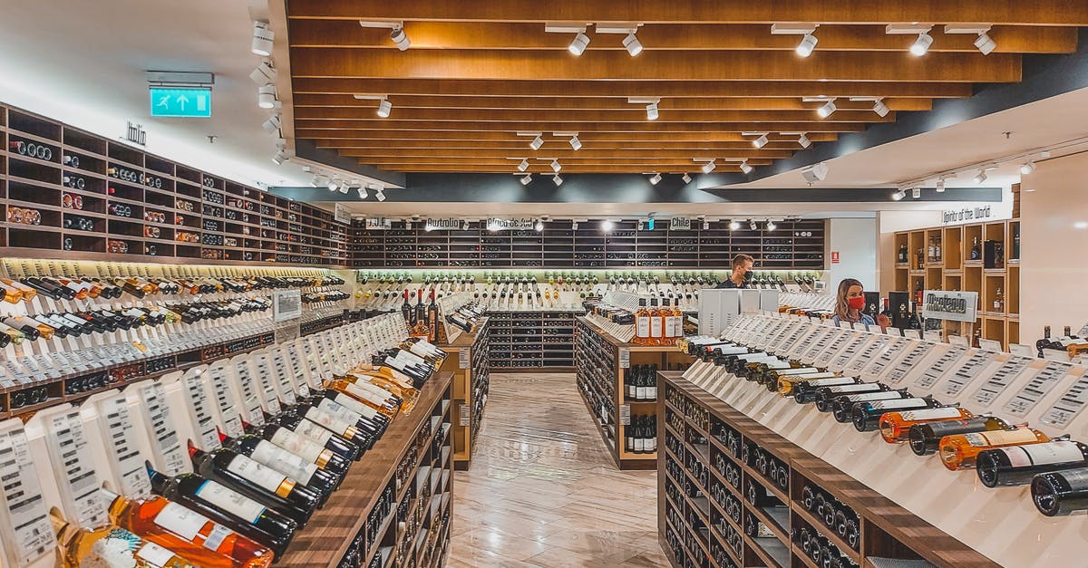 Buy alcohol duty-free or in US? - Wine on Display in a Wine Store