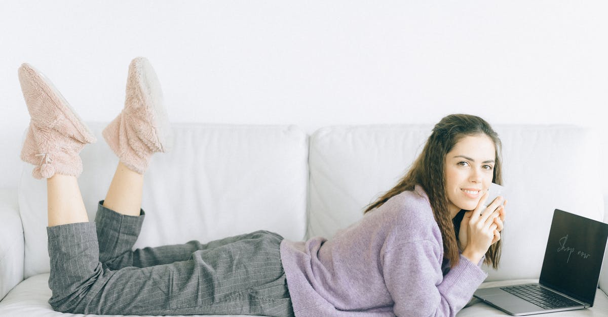 Buying a sim card in Italy - A Woman Lying on Sofa  Online Shopping