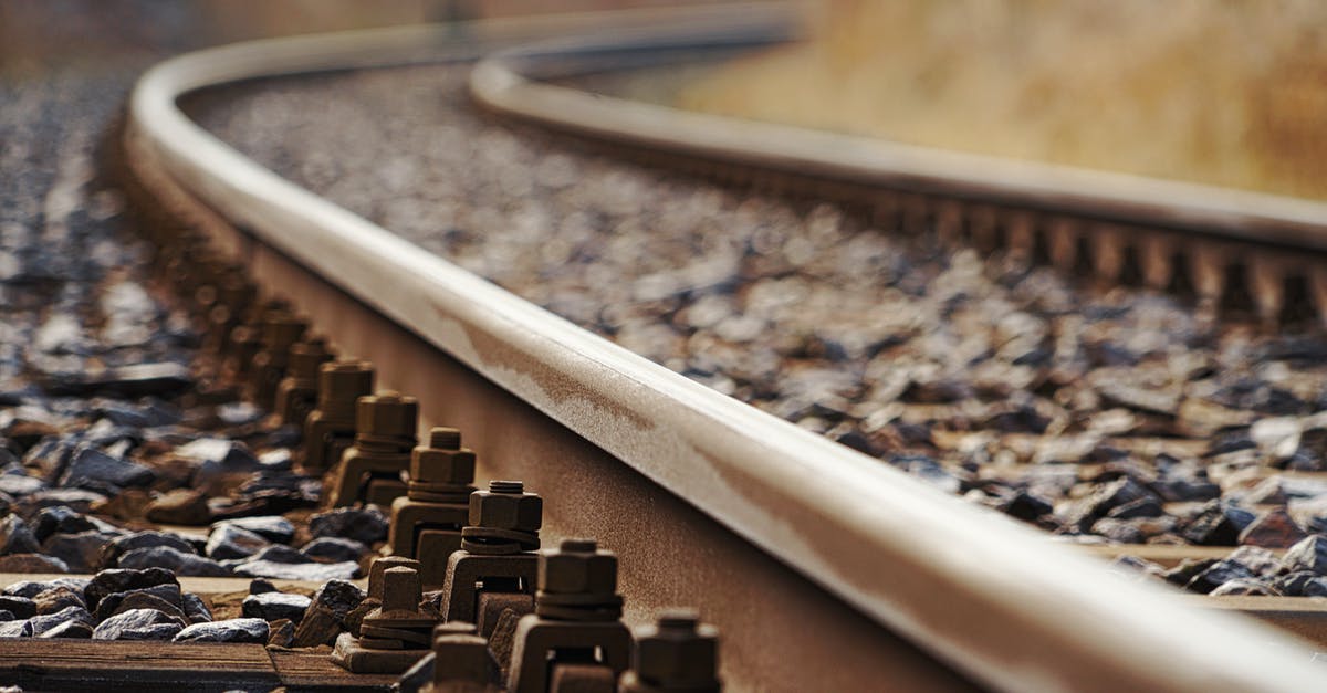 Buying Uzbek Rail Tickets [closed] - Close-Up Photo Of Rail Tracks