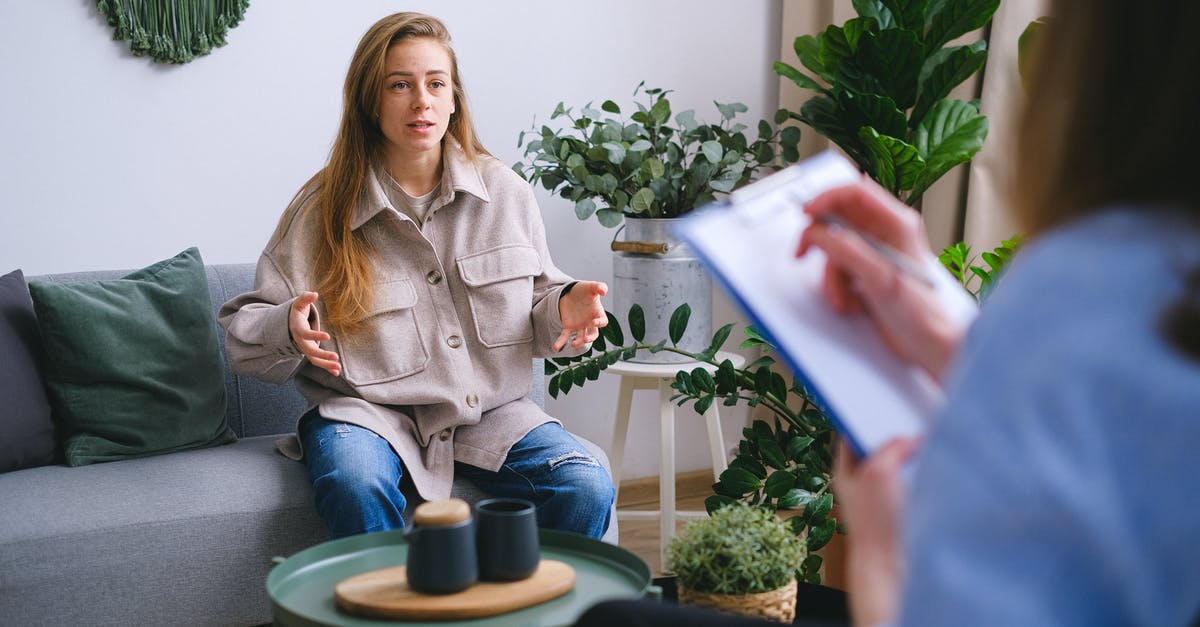 C visit visa issue - Woman explaining problems to crop psychologist