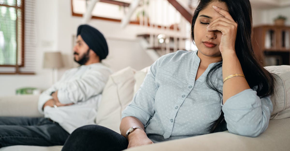 Can a husband and wife take Schengen visa appointments at separate centers? - Upset young Indian couple after conflict Can a husband and wife take Schengen visa appointments at separate centers? - Upset young Indian couple after conflict