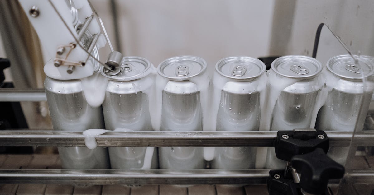 Can a rip on a suitcase be repaired with iron-on patches? - Cans of Beer in the Production Line