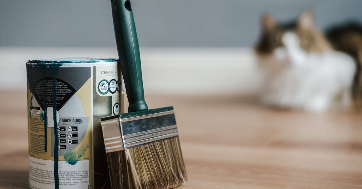 Can e-cigarettes / vaping set off smoke detectors? - Paint brush near can on floor at home