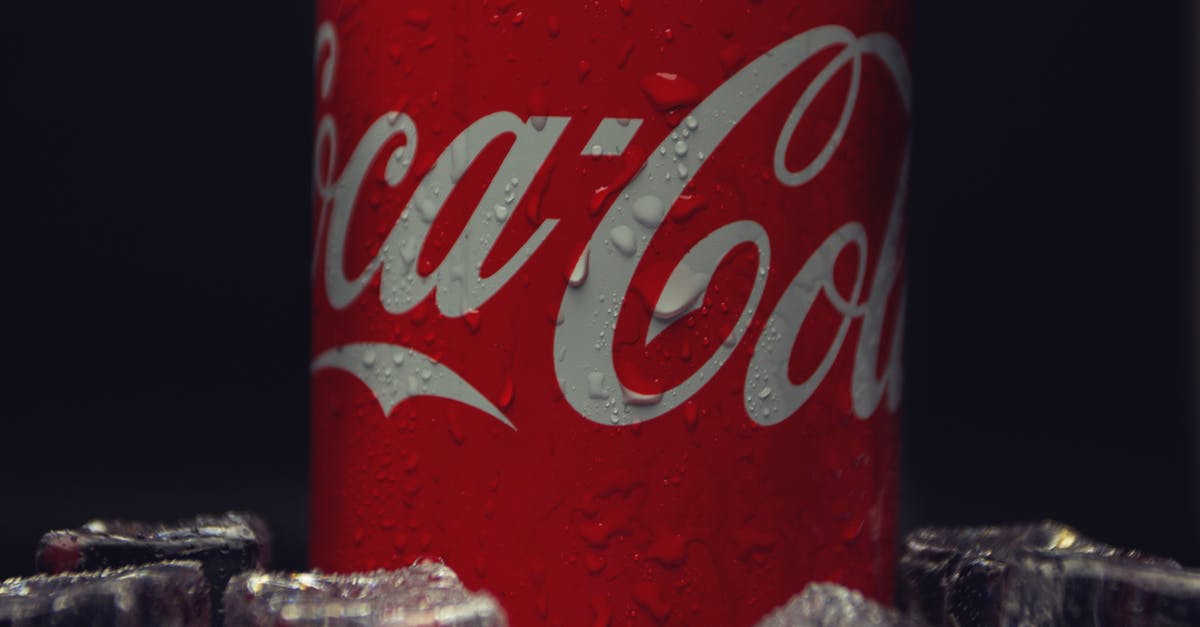 Can hotel kick me out into ice storm if I don't have more money? [closed] - Close-Up Shot of Red Coca-Cola in Can