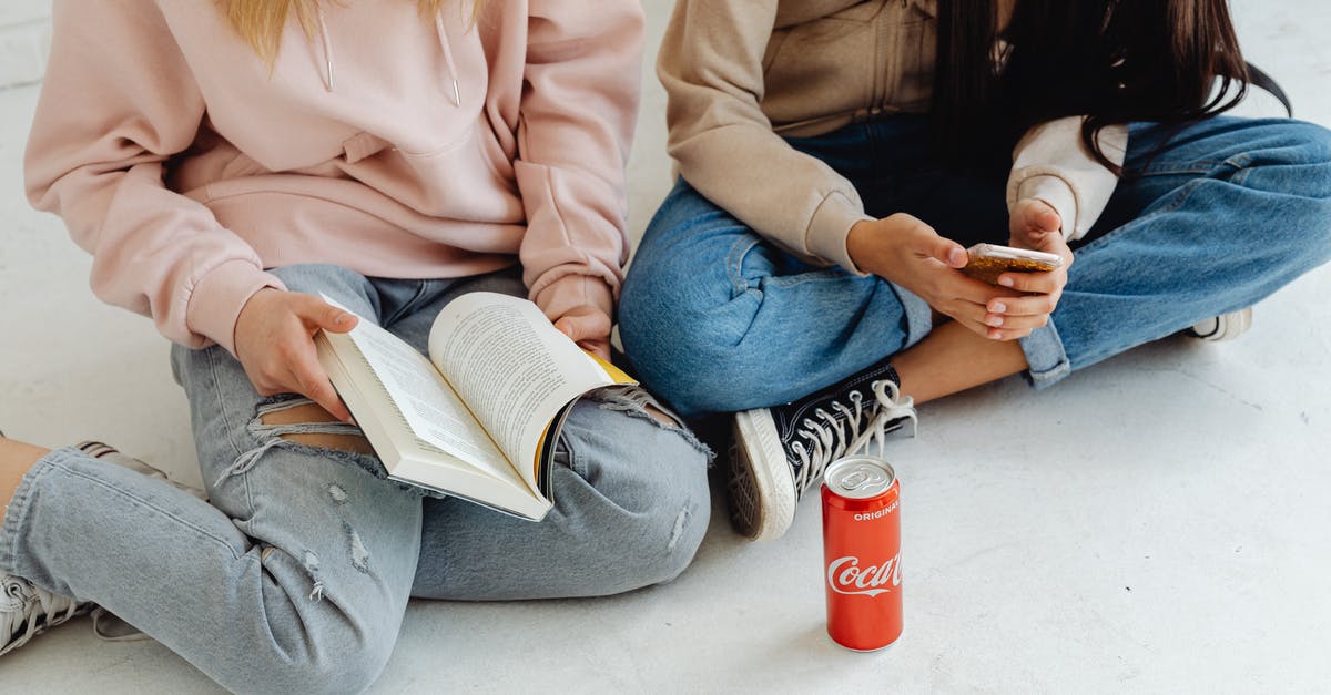 Can I bring an anti-religious book into Saudi Arabia? - Women Casually Sitting on the Floor