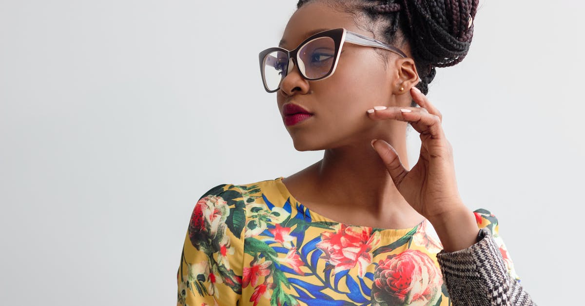 Can I bring an electric hair clipper in my hand luggage? - Photo of Woman Wearing Yellow Floral Top