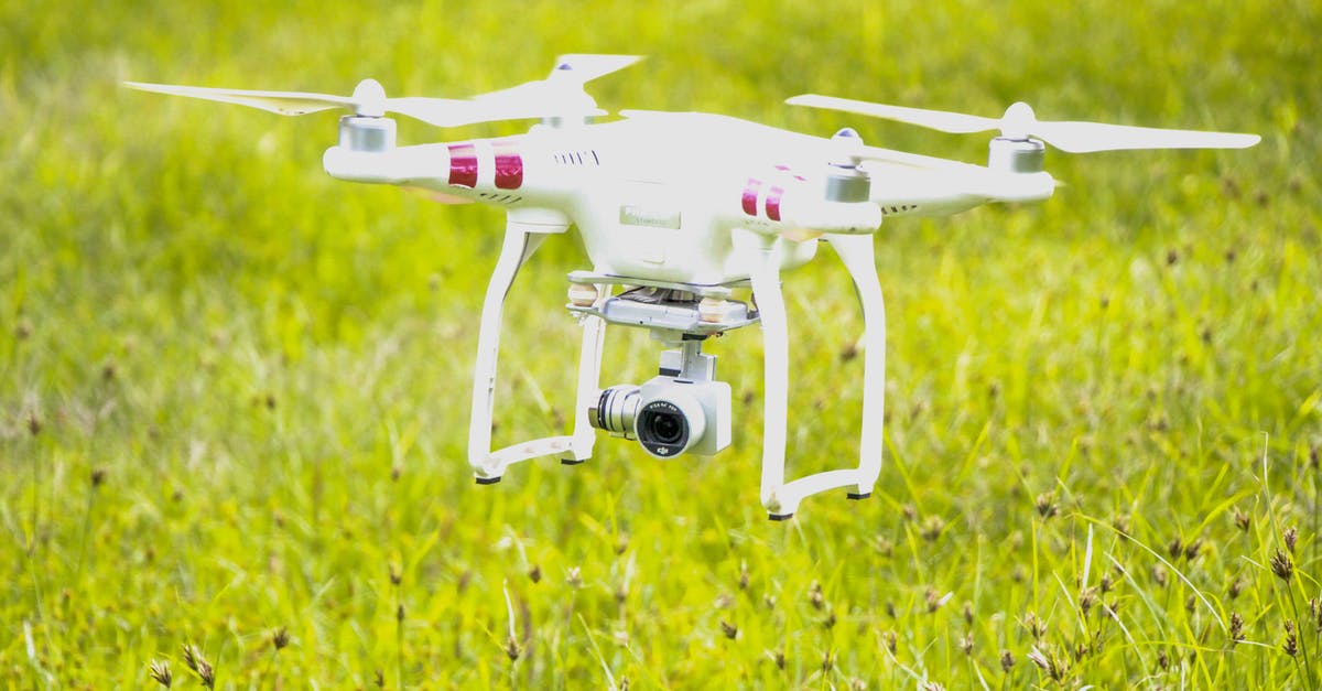 Can I bring my laptop, camera on flight to USA? [closed] - Close-Up Photo of Drone